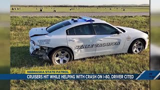 Nebraska state trooper’s cruiser hit while helping with crash on I-80, driver cited