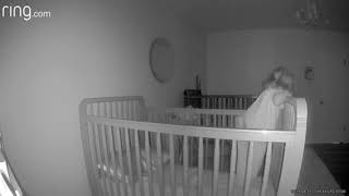 Girl tries to sneak out of crib but dad catches her before she's able to escape