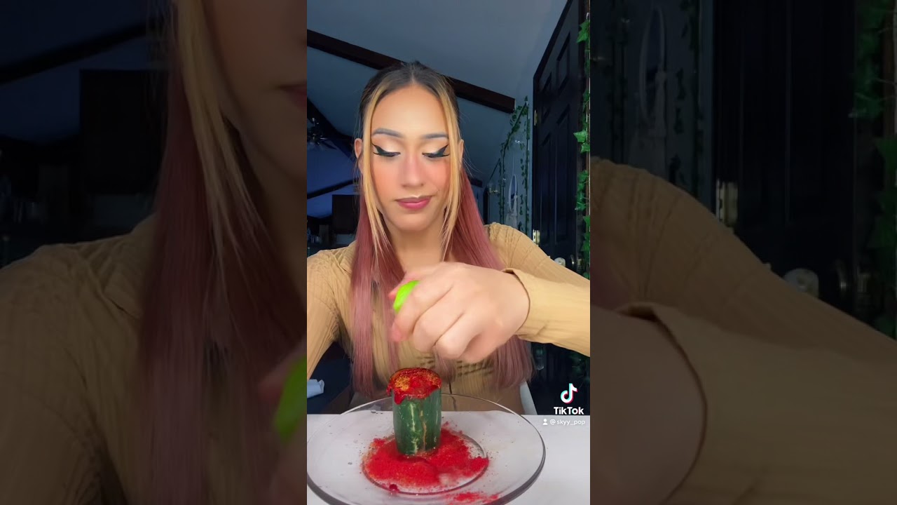 Cucumber Valentina hot Sauce Tajin & Takis powder