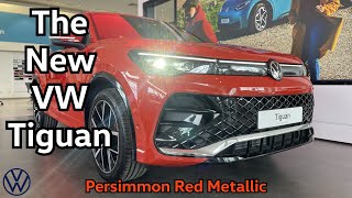 The new VW Tiguan in Persimmon red metallic. (Brochure in the description)