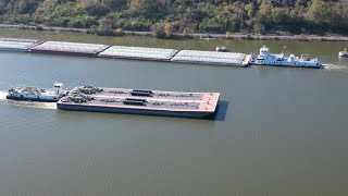 Mississippi River, Lock 19, Keokuk Iowa, Northbound and Southbound tow boats meet.