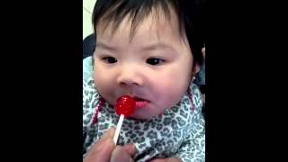 Baby Sister Licking Candy