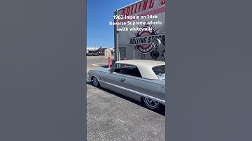 ‘63 Impala rockin a classic look on chrome 14x6 reverse Supreme rims wrapped with whitewall tires
