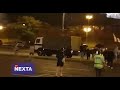 Момент наезда автозака на человека из толпы протестующих в Минске. Человеку оказана помощь.