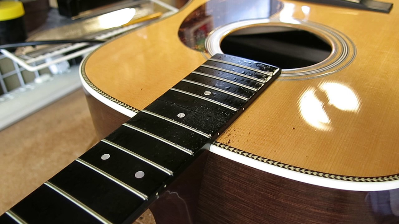 Drilling an access hole into the neck pocket for neck reset on Martin