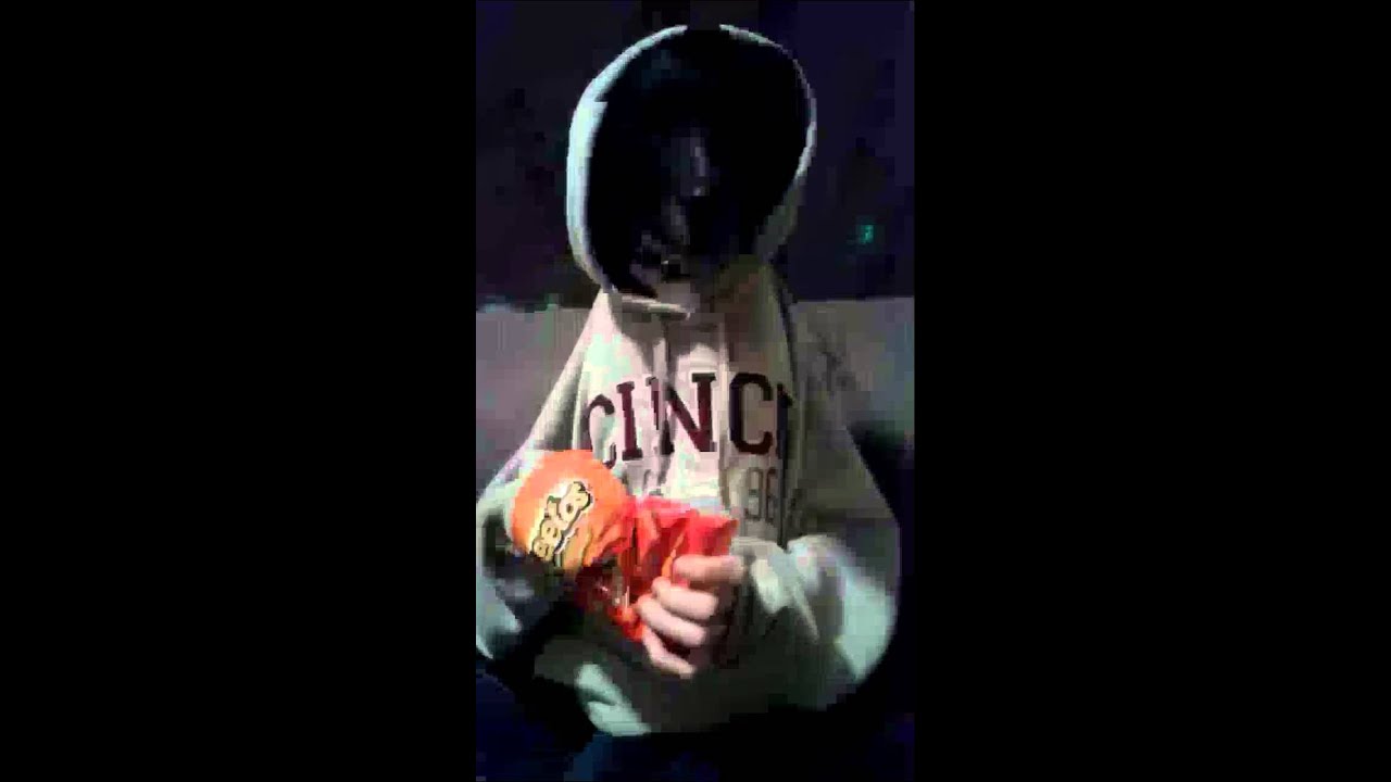 Dog in sweatshirt eating cheetos YouTube