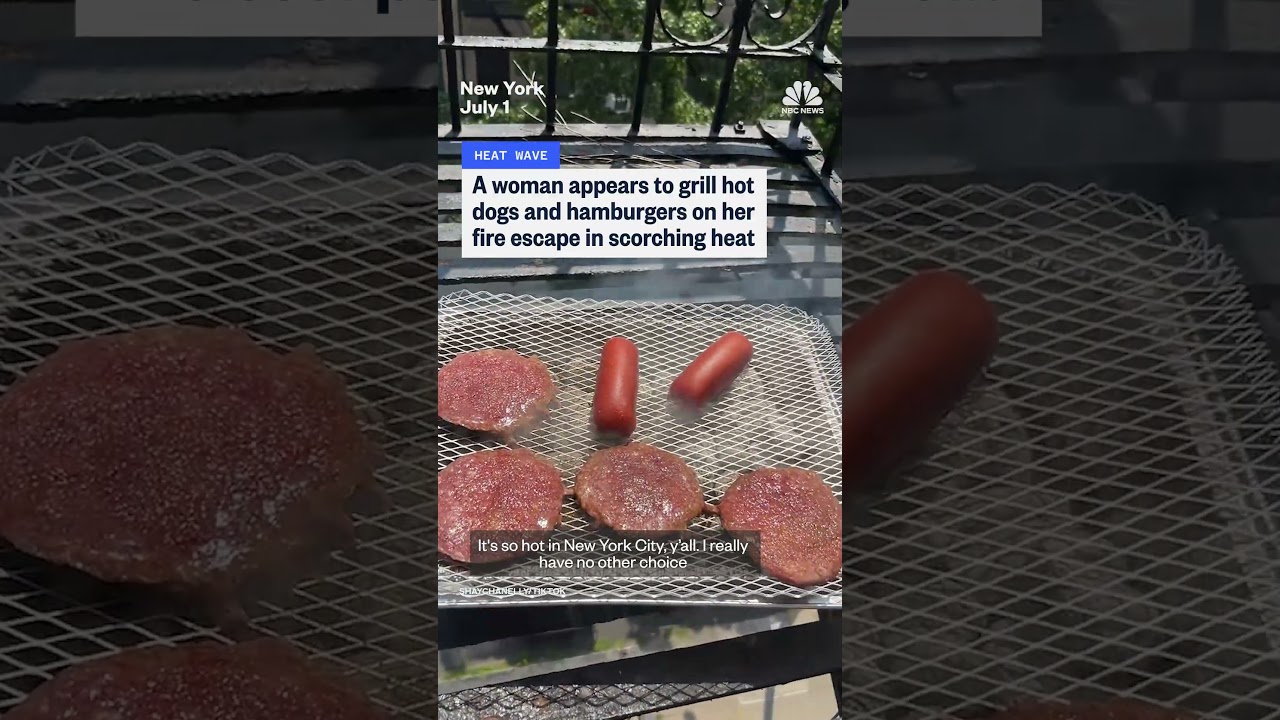Woman grills hot dogs and hamburgers on her NYC fire escape Woman grills hot dogs and hamburgers on her NYC fire escape