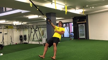 TRX Squat With Single Arm Bicep Curl