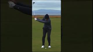 Scottie showing the recipe for flighted wedges: ball position back + hands forward