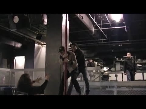 Pete Wentz and Patrick Stump working the pole