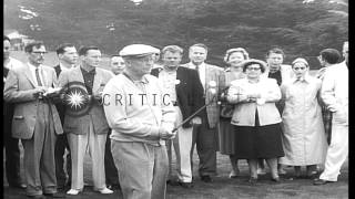 President Dwight D. Eisenhower practices his golf shots at Cypress Point Golf Cou...HD Stock Footage