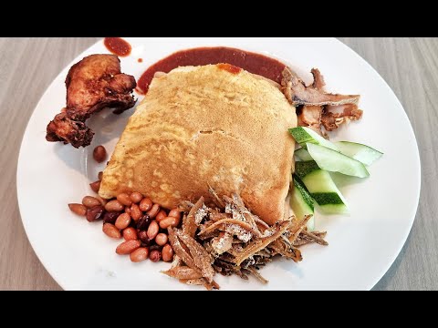 Unique Nasi Lemak Wrapped with Egg Omelette in Malaysia