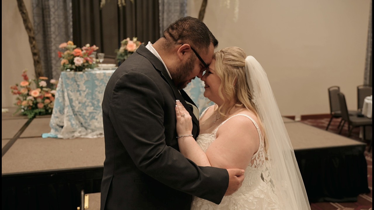 A still from Rebecca and Eric's wedding film at Renaissance Dallas Richardson Hotel by Toast Entertainment in Dallas-Fort Worth.
