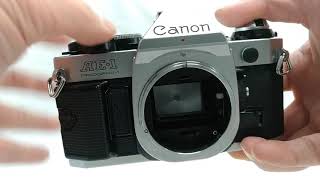 Canon AE-1 Program 35mm SLR Film Camera with New FD 50mm F/1.4 and