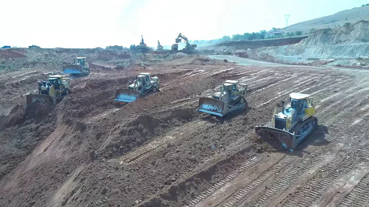 Five Bulldozers Caterpillar D9T Caterpillar D9R And Komatsu D275AX Working Team