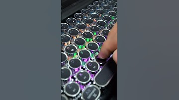 7KEYS TW1867 Typewriter Bluetooth Keyboard, with tablet stand.