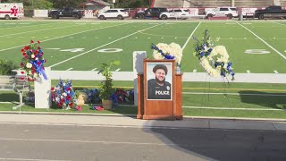 Fallen police officer Marc Brock is dedicated a portion of Hwy 1