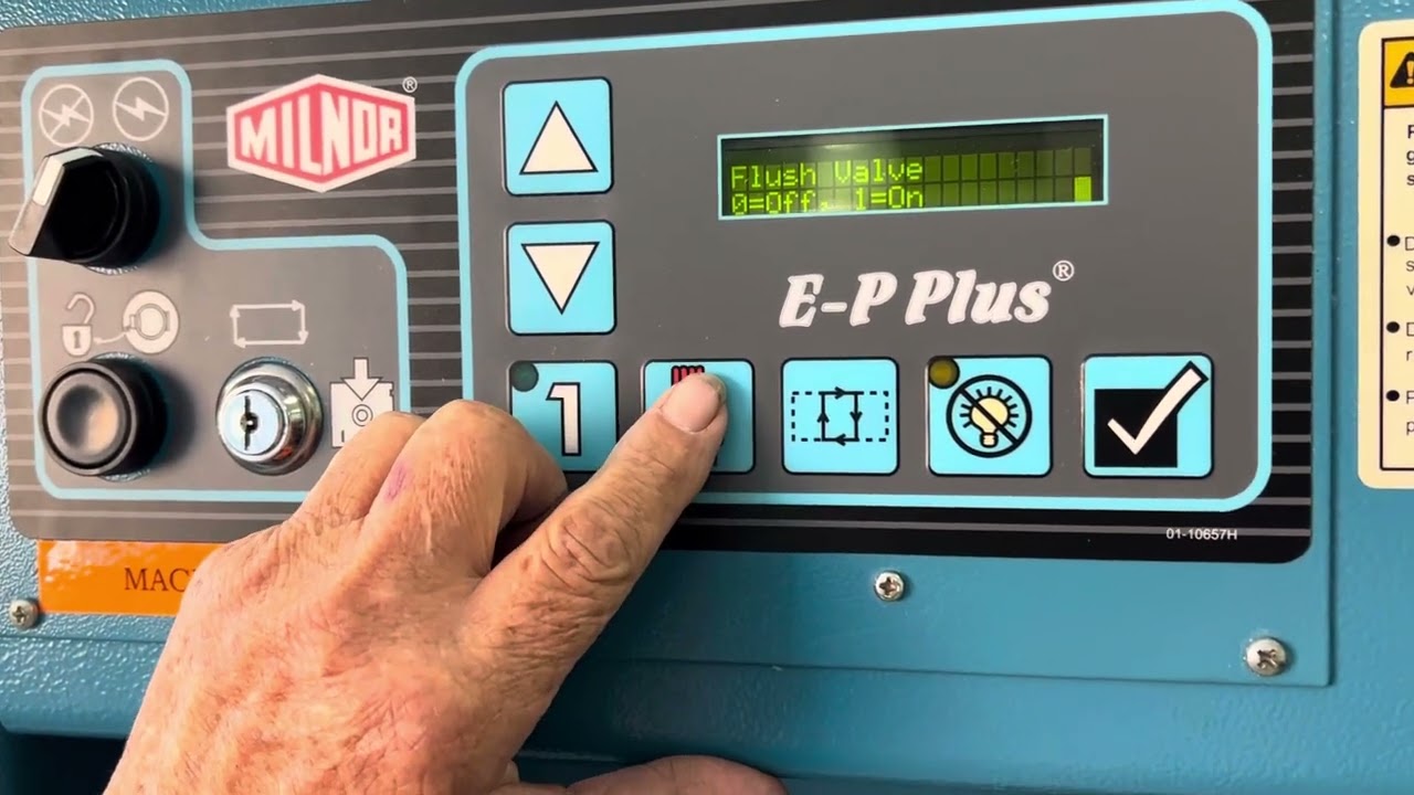 How to cycle outputs on a Milnor commercial washer