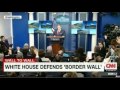 Breitbart reporter grills spicer on the wall fences bollard and levy walls