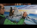Pintando un cuadro de caballos en el mar