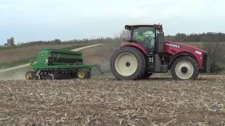 Seeding oats, peas and alfalfa mix with a new Versatile 290 tractor and a John Deere drill