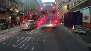 Bus in the middle of two lanes. even the car flashes him. when I say to him he said &quot;I know&quot;