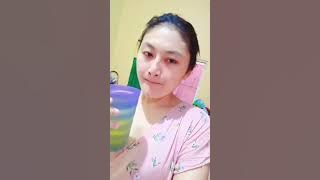 SITTING RELAXING ON THE FRONT PORCH OF THE HOUSE, JUST WEARING A DRESS