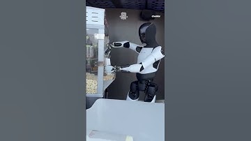 Optimus robot serves popcorn at Tesla’s new diner