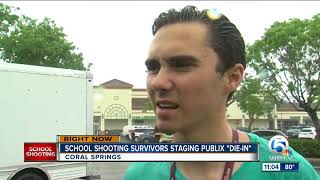 David Hogg draws body chalk outline in Publix 'die-in" protest