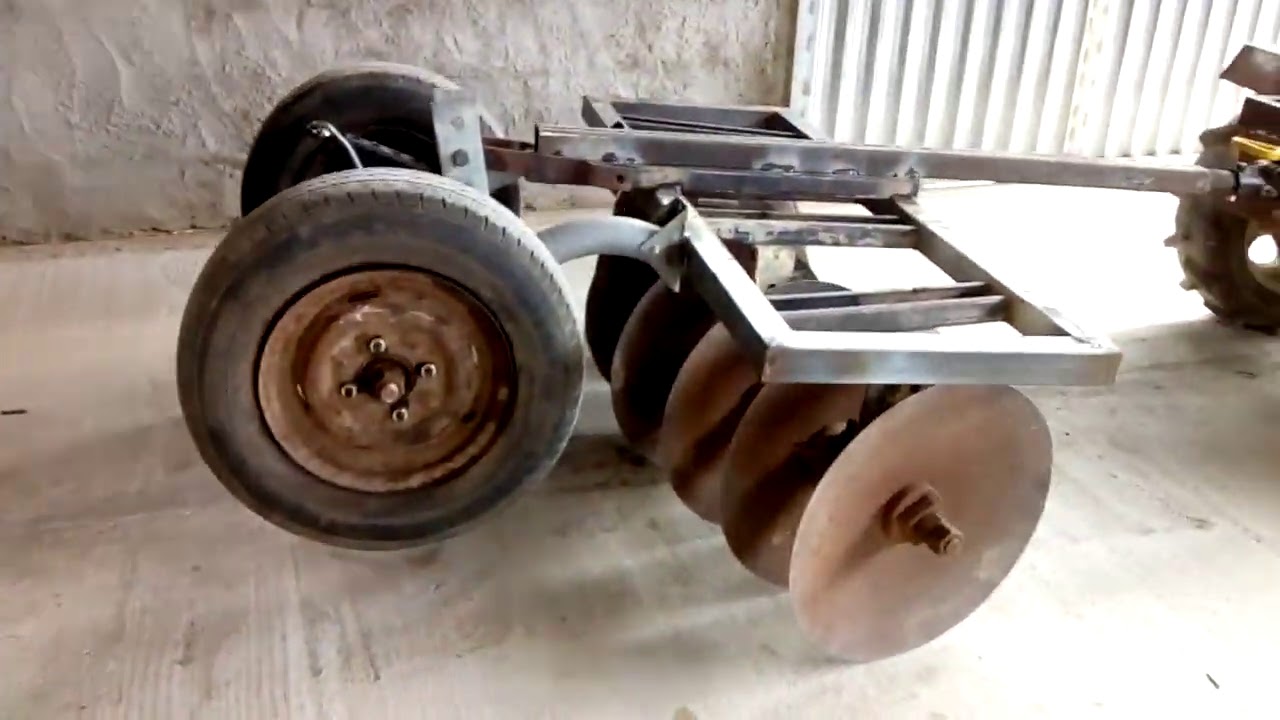 Arado caseiro com regulagem de altura .