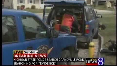 Police dredge pond near Grandville