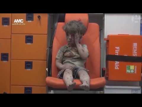 Syrian child pulled from rubble after Aleppo airstrike - video