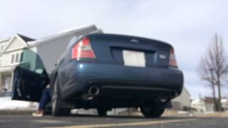 Nameless axleback exhaust on a 2005 Subaru Legacy 2.5i