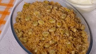 الأرز بالفول الأخضر  Cooked rice with broad beans