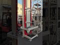 Fork-Arm continuous vertical lift