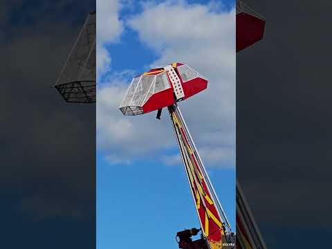 Carnival ride operator left dangling in the air after strong winds sent ride car into air #Shorts