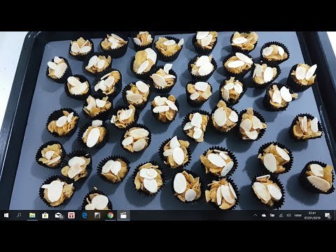 Honey Corn Flakes Cups With Almond Slices.