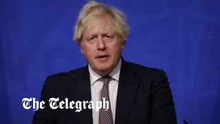 video: Boris Johnson announces new restrictions on travel and face masks to slow omicron variant