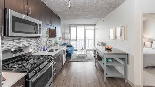 A sunset view 1-bedroom model at the boutique Gateway West Loop