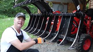 #178 kubota B2601 compact tractor. I finally pushed the grapple too far. outdoor channel.