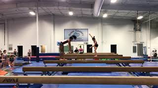 Switch leap back tuck through back handspring layout step out