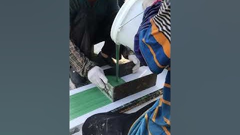 How to apply glue to the seam tape # artificial grass installation series video by ACT GROUP