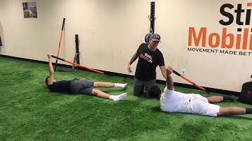 Arm Bar Stretch Shoulder Mobility Drill - Stick Mobility Exercise