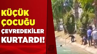 Mersin'de sulama kanalına düşen 6 yaşındaki çocuğu çevredekiler kurtardı | A Haber Resimi