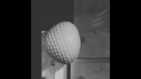 Slow Motion of Golf Ball hitting wall at 200mph!