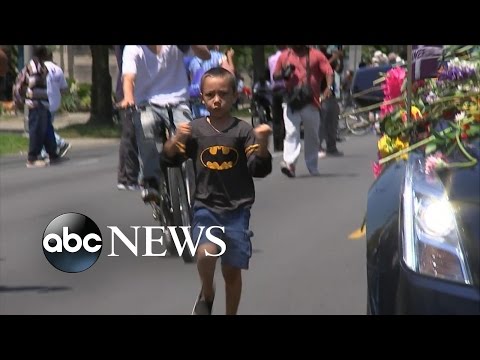 Muhammad Ali Funeral | Batboy Throws Firsts Alongside Hearse