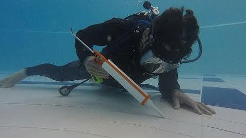 Underwater pool tile regrouting  #underwaterpoolrepairs