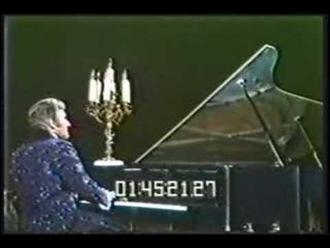 Here is Liberace again for the 60's playing Moonlight Sonata