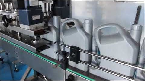 Automatic jerry can spindle capping induction sealing labeling line
