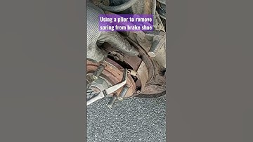 how to remove return spring from brake shoe. using a plier. #parkingbrake. #cars